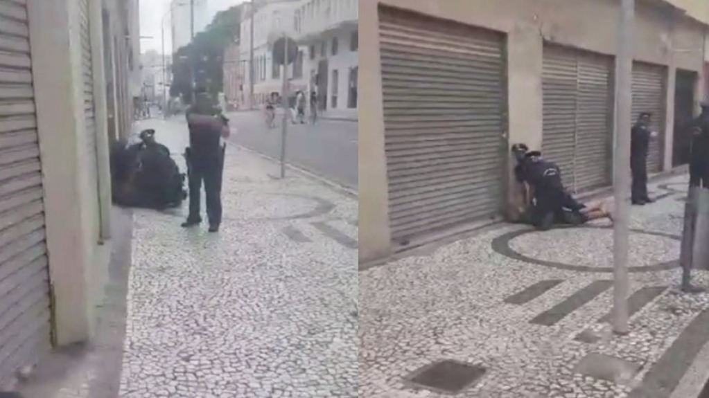 Guarda aponta arma para pessoas que filmaram agressão a homem negro