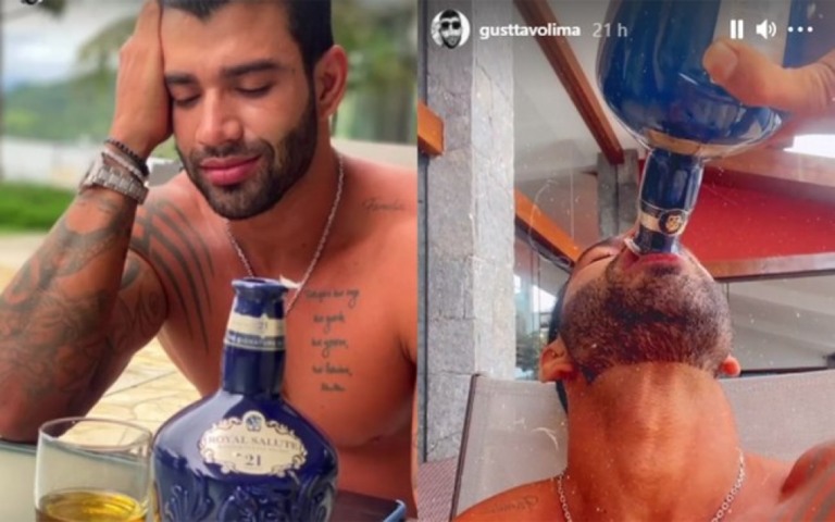 Gusttavo Lima seca garrafa de uísque de R$ 1,1 mil em tarde de bebedeira
