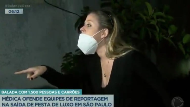 Médica hostiliza reportagem da Record TV após ser pega em festa clandestina