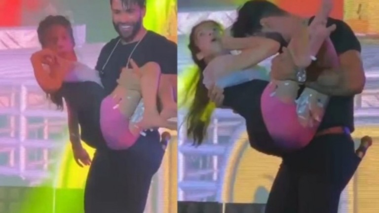 Gusttavo Lima pega adolescente com paralisia cerebral no colo em show