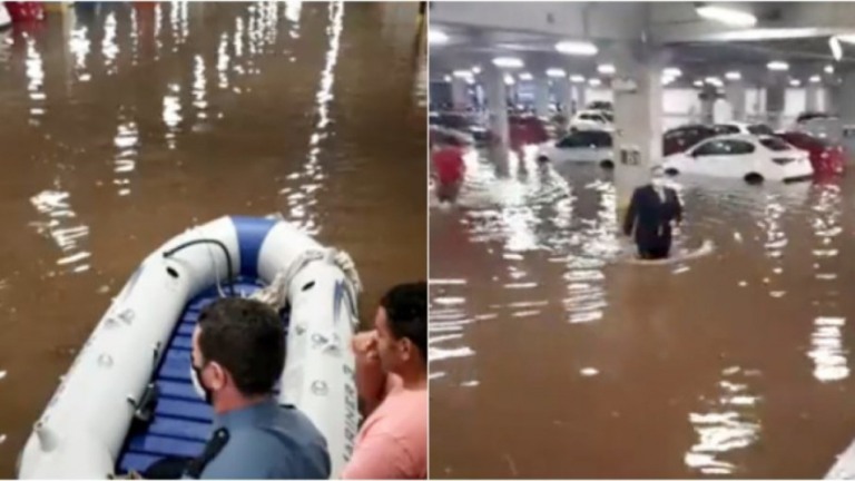 VÍDEO: após temporal, motoristas são retirados de shopping com bote