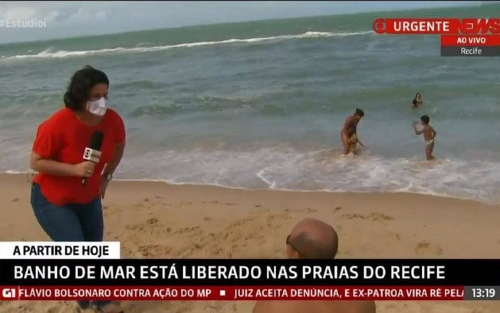 Repórter dá bronca em banhista sem máscara ao vivo na GloboNews