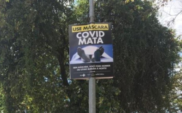 MG: Prefeitura usa fotos de corpos e caixões em cartazes para "chocar população"